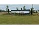 Walden Park community sign on a sunny day with a large green lawn at 1346 Riverstone Rd # 107, Jonesboro, GA 30238