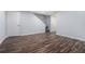 Spacious finished basement with vinyl floors, white trim, and access to stairs and another room at 2480 Washington Street Ext # 2482, Austell, GA 30106