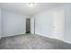 Bright bedroom with gray carpet and neutral walls at 2480 Washington Street Ext # 2482, Austell, GA 30106