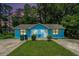 Charming light blue duplex with well-maintained lawn and wooded surroundings at 2480 Washington Street Ext # 2482, Austell, GA 30106