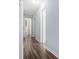 Hallway with light blue walls and wood-look flooring at 2480 Washington Street Ext # 2482, Austell, GA 30106