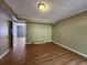 Spacious living room with hardwood floors and natural light at 5619 Wandering Vine Se Ln, Mableton, GA 30126