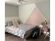 Bedroom with neutral paint, and a stylish design accent wall at 1517 Gilstrap Nw Ln, Atlanta, GA 30318
