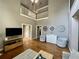 Spacious living room with hardwood floors, modern decor and neutral paint at 1517 Gilstrap Nw Ln, Atlanta, GA 30318
