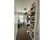 Spacious walk-in closet with extensive shelving and storage, ideal for organizing clothes and accessories at 1517 Gilstrap Nw Ln, Atlanta, GA 30318