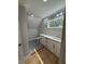 Bright bathroom with double vanity, modern fixtures, and neutral finishes for a clean and inviting space at 1713 Cagle Ct, Lawrenceville, GA 30045