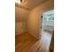 Cozy bedroom with wood floors, adjoining bathroom, and attic access, a private and functional space at 1713 Cagle Ct, Lawrenceville, GA 30045