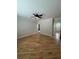Serene bedroom with wood flooring, neutral walls, and a ceiling fan for comfortable living at 1713 Cagle Ct, Lawrenceville, GA 30045