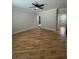 Open bedroom with wood floors and natural light, creating a warm and inviting atmosphere at 1713 Cagle Ct, Lawrenceville, GA 30045