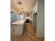 Contemporary kitchen showcases an island with storage and seating, plus stainless appliances at 1713 Cagle Ct, Lawrenceville, GA 30045