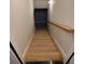 Wooden staircase leads down to the basement at 1713 Cagle Ct, Lawrenceville, GA 30045