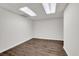Finished basement featuring modern lighting and wood-look flooring at 2010 Riverside Rd, Roswell, GA 30076