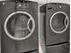 Modern front load dark gray washer and dryer, for efficient laundry experience at 2010 Riverside Rd, Roswell, GA 30076