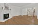 Spacious living room with hardwood floors, fireplace, and ample natural light at 2010 Riverside Rd, Roswell, GA 30076