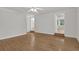 Living room highlighting hardwood floors and bright, white walls at 2010 Riverside Rd, Roswell, GA 30076