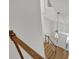 Staircase boasting natural light and an elegant hanging light fixture at 2010 Riverside Rd, Roswell, GA 30076