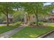 Charming street view showcases well-manicured lawns, mature trees, and inviting homes at 2010 Riverside Rd, Roswell, GA 30076