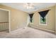 Bedroom with soft carpet, light beige walls, and natural light at 4772 Ridgewood Nw Ct, Acworth, GA 30102