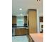 Functional kitchen featuring wood cabinets, stainless appliances, and an open layout at 5607 Mountainbrooke Ct, Stone Mountain, GA 30087