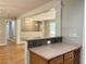 Inviting living space featuring hardwood floors, wainscotting, and open access to other areas of the home at 5607 Mountainbrooke Ct, Stone Mountain, GA 30087