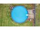 Aerial view of swimming pool with sundeck and steps with clear blue water at 572 Boulder View Pkwy, Dallas, GA 30157
