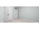 Bedroom with double doors and neutral color scheme at 572 Boulder View Pkwy, Dallas, GA 30157