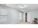 Bedroom with a chair, carpeted floors and natural light at 572 Boulder View Pkwy, Dallas, GA 30157