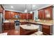 Modern kitchen showcasing granite countertops, stainless steel appliances, and ample cabinet space at 572 Boulder View Pkwy, Dallas, GA 30157