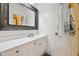 Bathroom with an ornate mirror over a vanity with a white countertop at 2112 Murren Se Dr, Smyrna, GA 30080