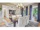 Open dining area with a view to the office, hardwood floors, and natural light at 2112 Murren Se Dr, Smyrna, GA 30080