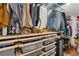Walk-in closet featuring an organized shelving system and ample storage space at 642 Erin Sw Ave, Atlanta, GA 30310