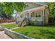 Beautiful craftsman-style home featuring lush green lawn, landscaped yard, and inviting entrance at 642 Erin Sw Ave, Atlanta, GA 30310