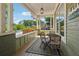 Inviting covered front porch with seating area, perfect for relaxing and enjoying the outdoors at 642 Erin Sw Ave, Atlanta, GA 30310