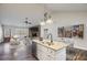 Spacious living room with an open kitchen, complete with an island and modern finishes at Lot 1 Perkins Rd, Dallas, GA 30157