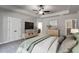 Relaxing main bedroom with ceiling fan, television, and beautiful decorative furnishings at Lot 1 Perkins Rd, Dallas, GA 30157