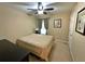 Inviting bedroom with carpet, ceiling fan, and neutral decor creating a peaceful ambiance at 125 Redsage Rdg, Atlanta, GA 30349