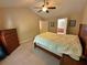 Spacious bedroom with vaulted ceilings and a warm, inviting ambiance at 125 Redsage Rdg, Atlanta, GA 30349