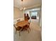 A cozy dining area with a chandelier and wooden furniture is visible at 125 Redsage Rdg, Atlanta, GA 30349