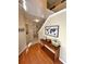Inviting foyer featuring hardwood floors, a stylish console table, and neutral paint, creating a warm welcome at 125 Redsage Rdg, Atlanta, GA 30349