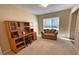 A comfortable home office area with a built-in desk and natural light at 125 Redsage Rdg, Atlanta, GA 30349