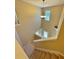 An open stairway view from above with natural light streaming through windows at 125 Redsage Rdg, Atlanta, GA 30349