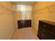 Walk-in closet with shelving and ample storage space with two dressers at 125 Redsage Rdg, Atlanta, GA 30349