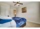 Comfortable bedroom with a ceiling fan and bright natural light at 1835 Henley Way, Alpharetta, GA 30009