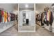 Large walk-in closet with ample shelving and storage for clothes, shoes, and accessories at 1835 Henley Way, Alpharetta, GA 30009