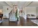 Grand foyer featuring hardwood floors and a staircase leading to the second floor at 1835 Henley Way, Alpharetta, GA 30009