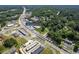 Aerial view of 2155 Rosedale Dr Snellville GA, showcasing the surrounding commercial area and lush landscape at 2155 Rosedale Rd, Snellville, GA 30078