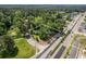 Aerial view displaying the approximate lot lines of the property's 0.70+/- acres close to surrounding roadways at 2155 Rosedale Rd, Snellville, GA 30078