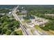 Aerial view of 2155 Rosedale Dr Snellville GA, showcasing the surrounding commercial area and lush landscape at 2155 Rosedale Rd, Snellville, GA 30078