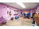 Finished basement has a fitness area and musical instrument display at 117 Franklin Rd, Woodstock, GA 30188