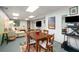 Finished basement features a dining area and living area with a large sectional sofa at 117 Franklin Rd, Woodstock, GA 30188